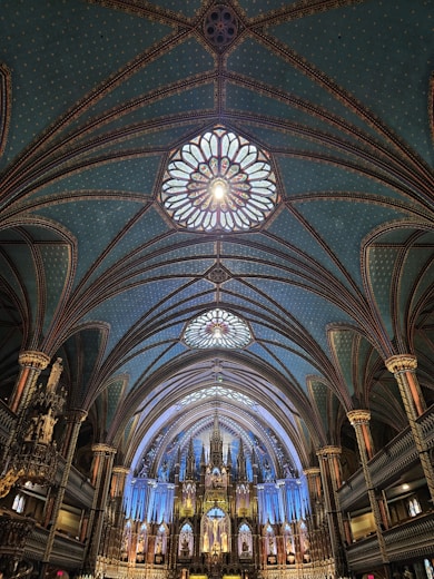 A large cathedral with a massive stained glass window