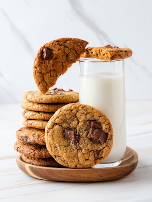 A plate of cookies and a glass of milk