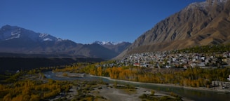 An aerial view of a town in the mountains