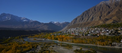 An aerial view of a town in the mountains