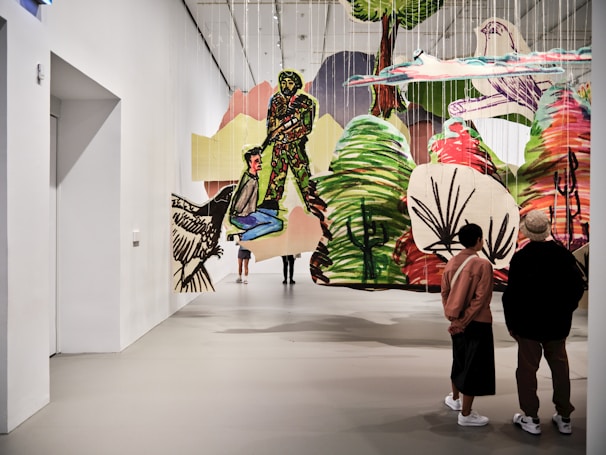 A couple of people that are standing in a room