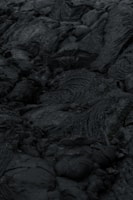 A close up of rocks with a sky in the background