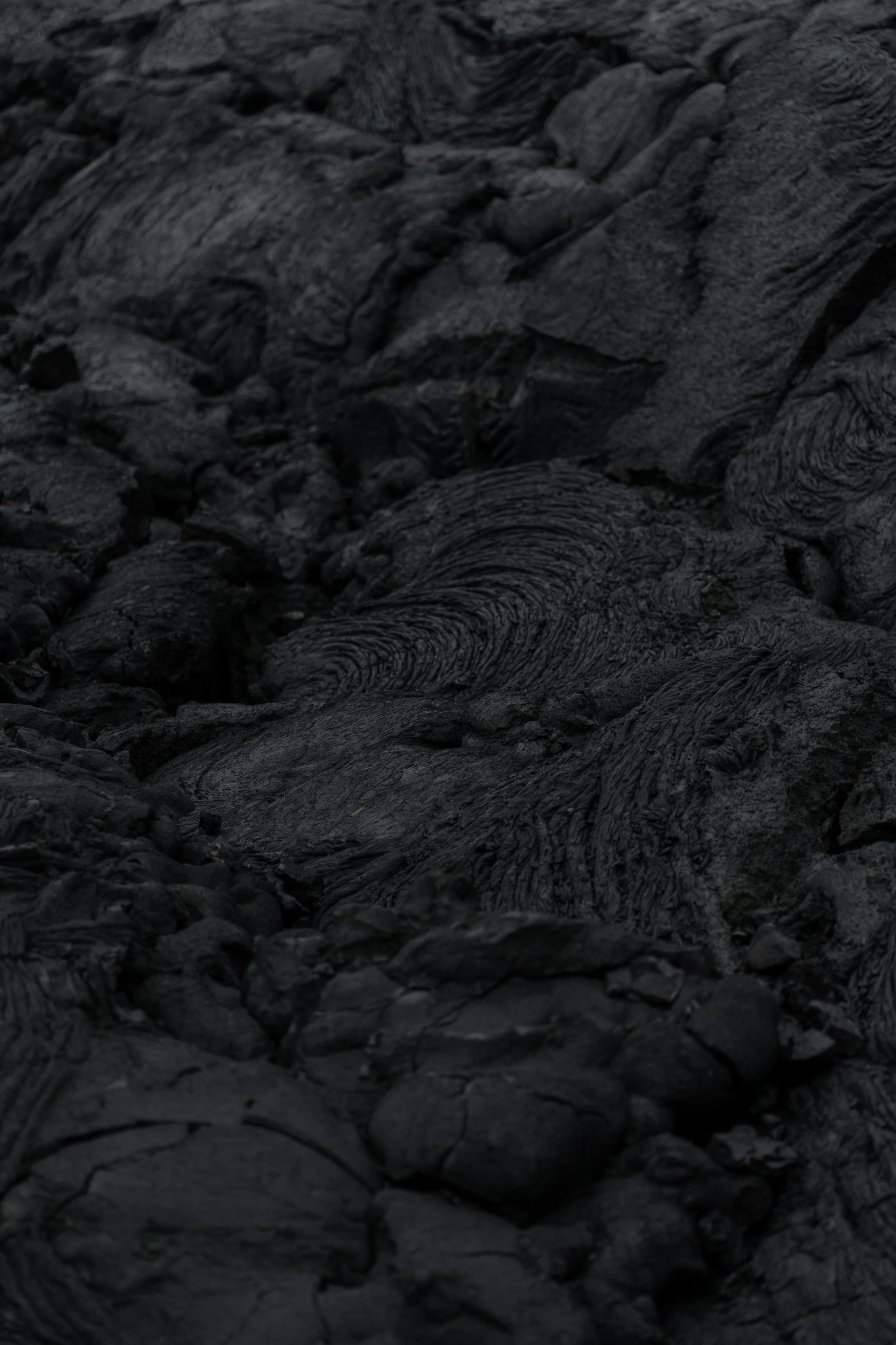 A close up of rocks with a sky in the background