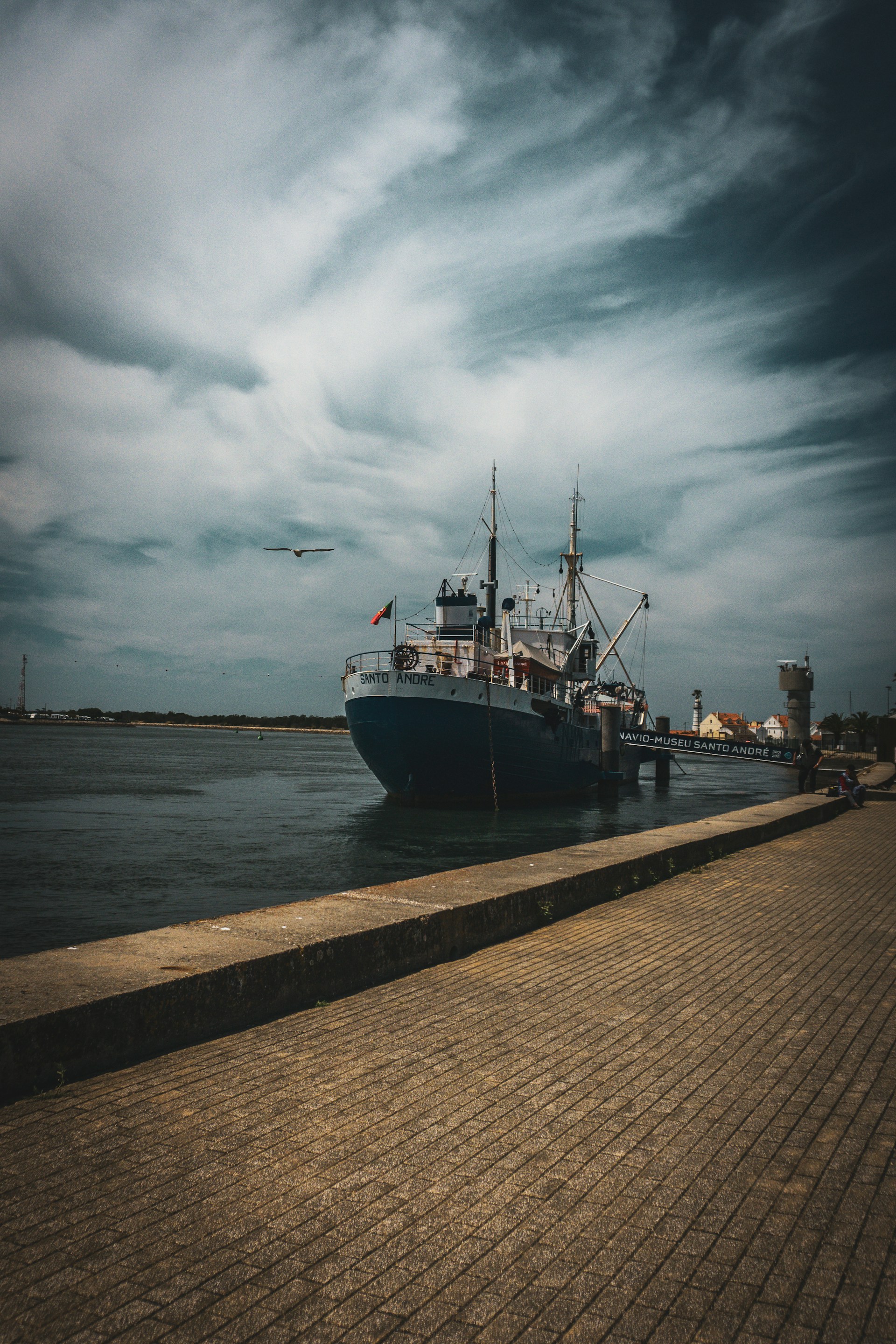 A large boat sitting in the middle of a body of water