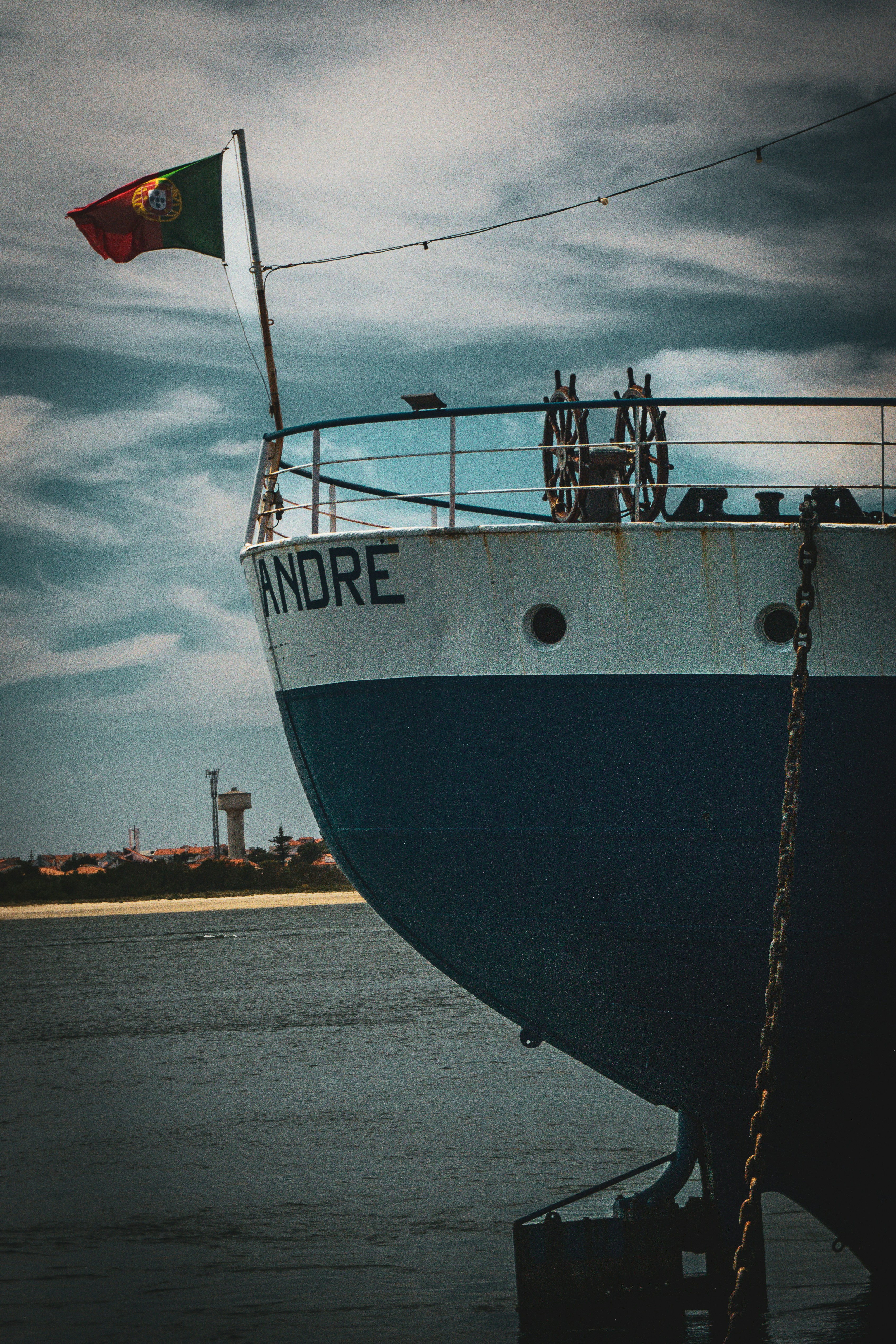 A large boat sitting on top of a body of water
