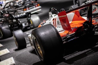A close up of a race car on display