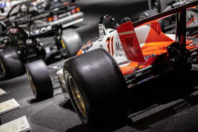 A close up of a race car on display
