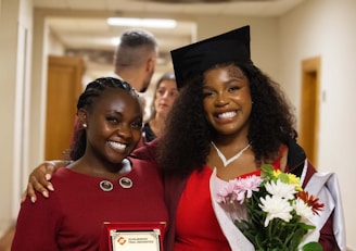 A couple of women standing next to each other