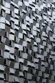 A close up of a wall made of cubes