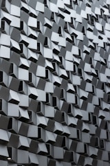 A close up of a wall made of cubes