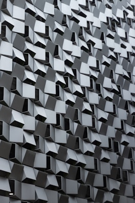 A close up of a wall made of cubes