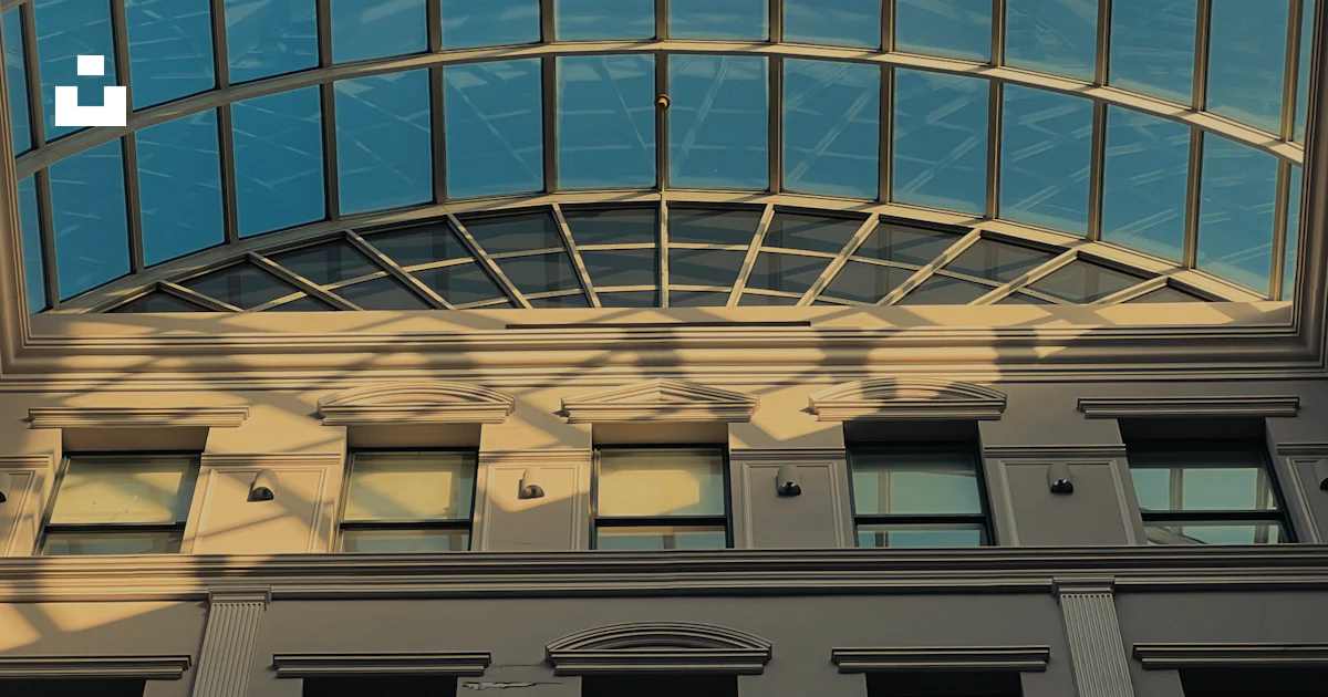 Building Texture Skylight A tall building with lots of windows and a skylight photo – Free ...