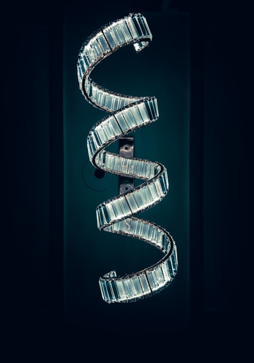 A poster with a spiral design on it