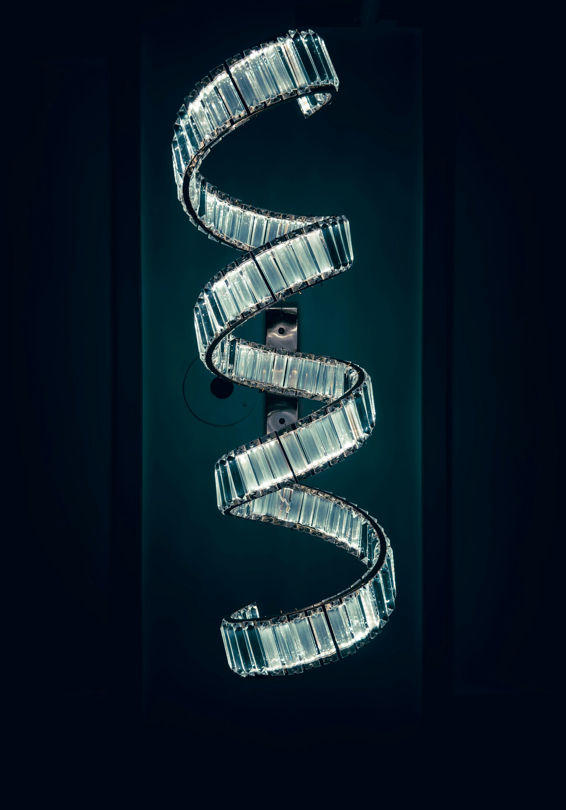 A poster with a spiral design on it