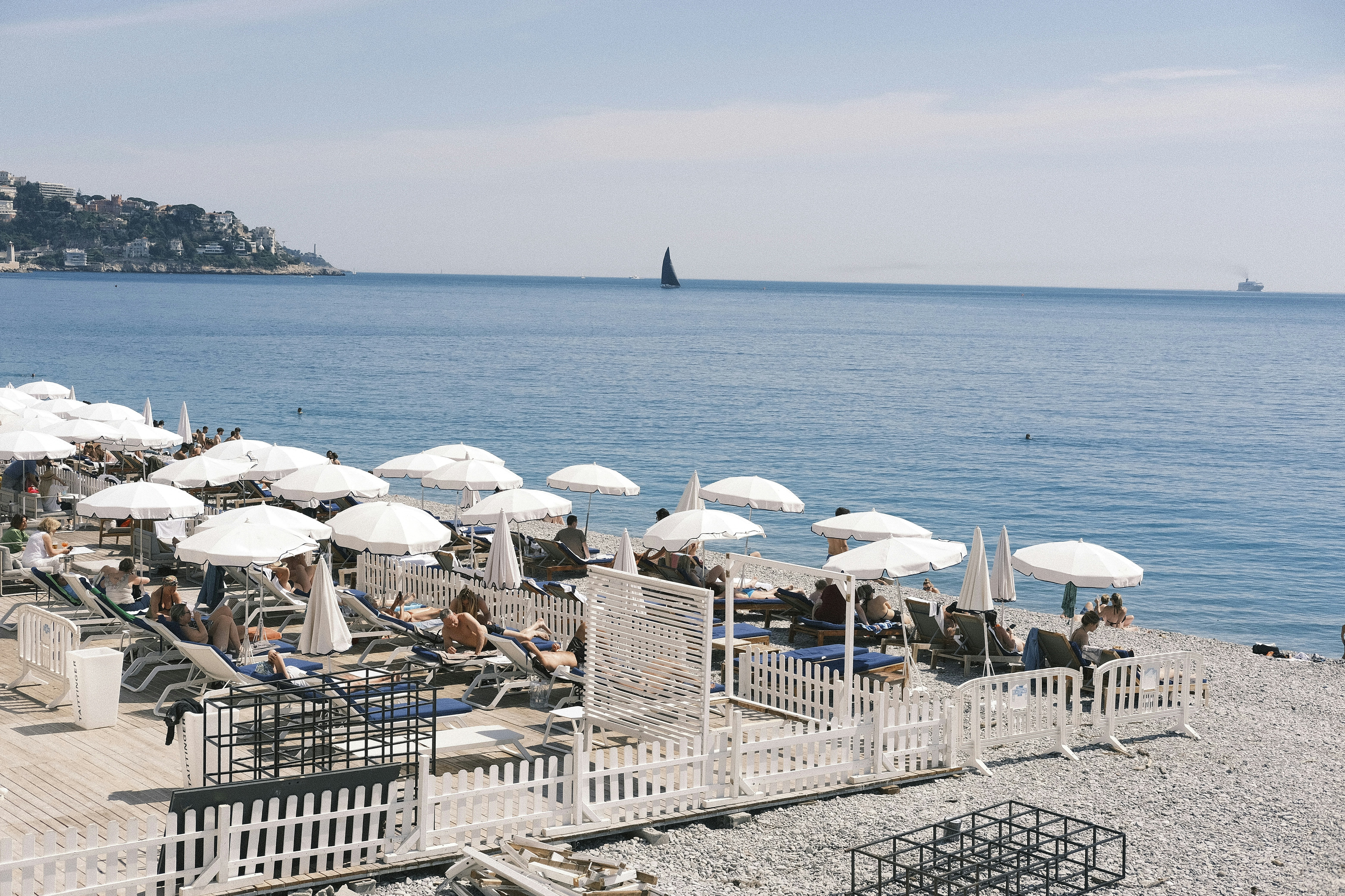 A bunch of umbrellas that are on a beach