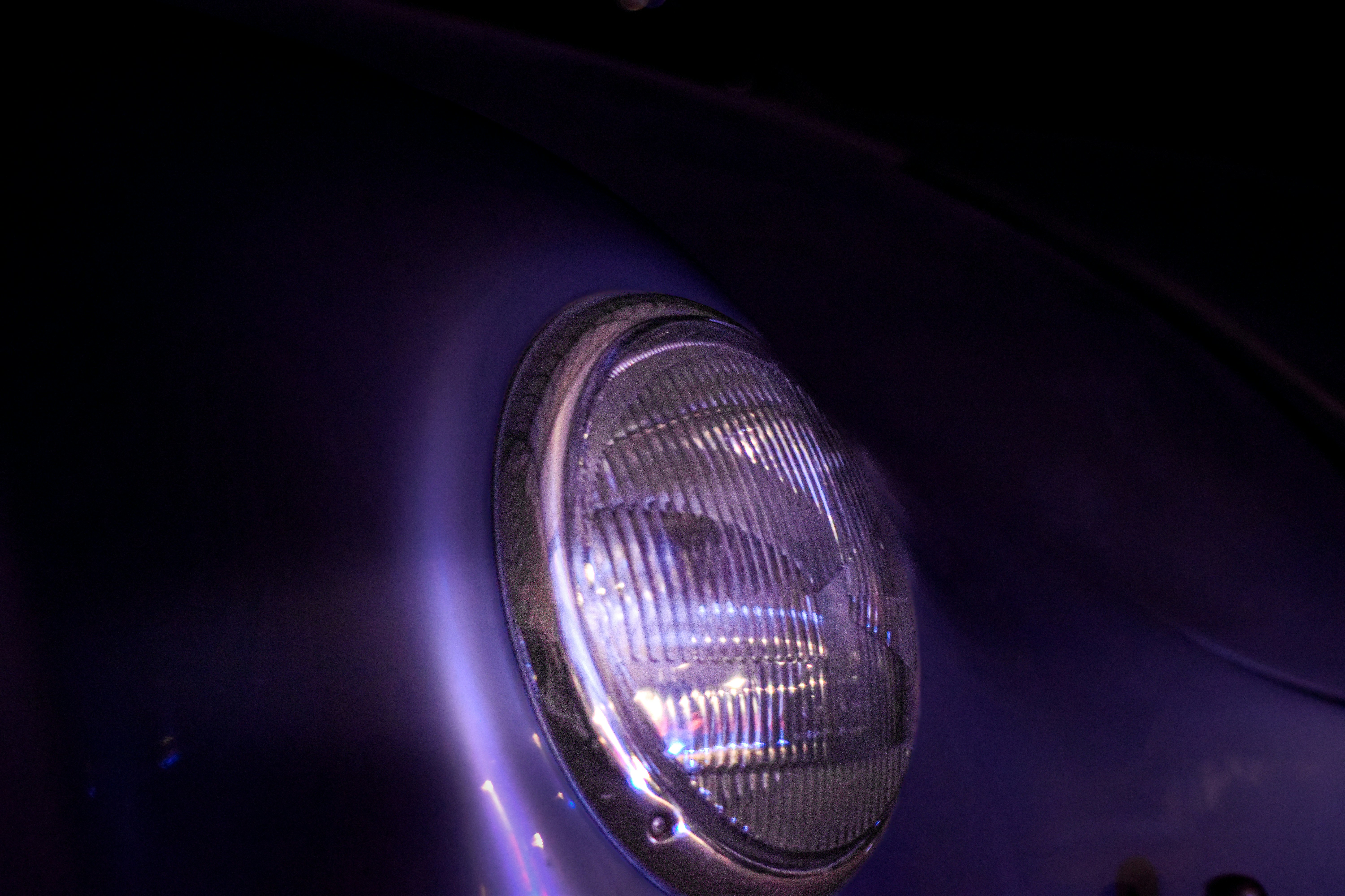 A close up of a headlight on a car