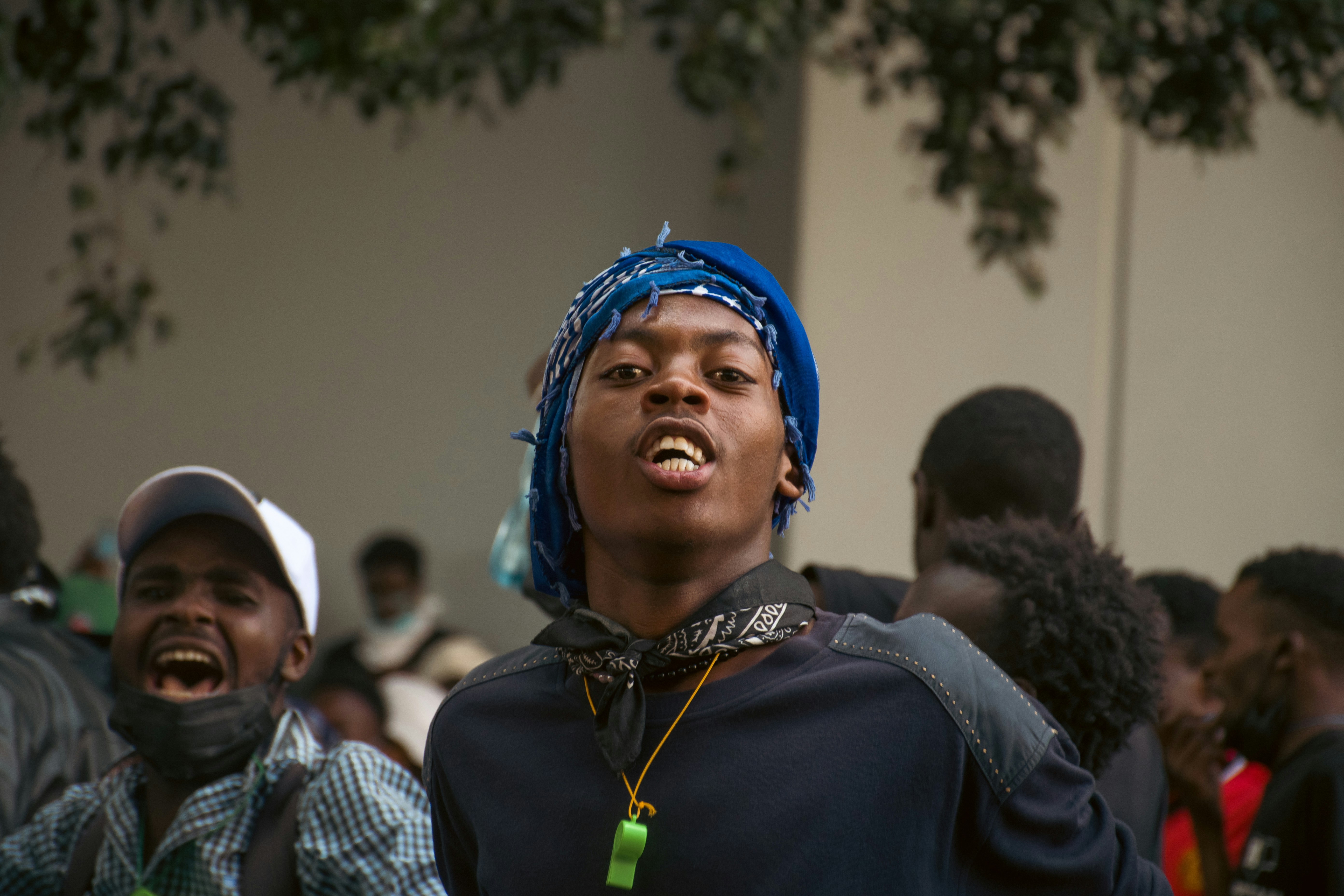 A group of people standing next to each other