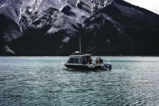 A boat floating on top of a large body of water