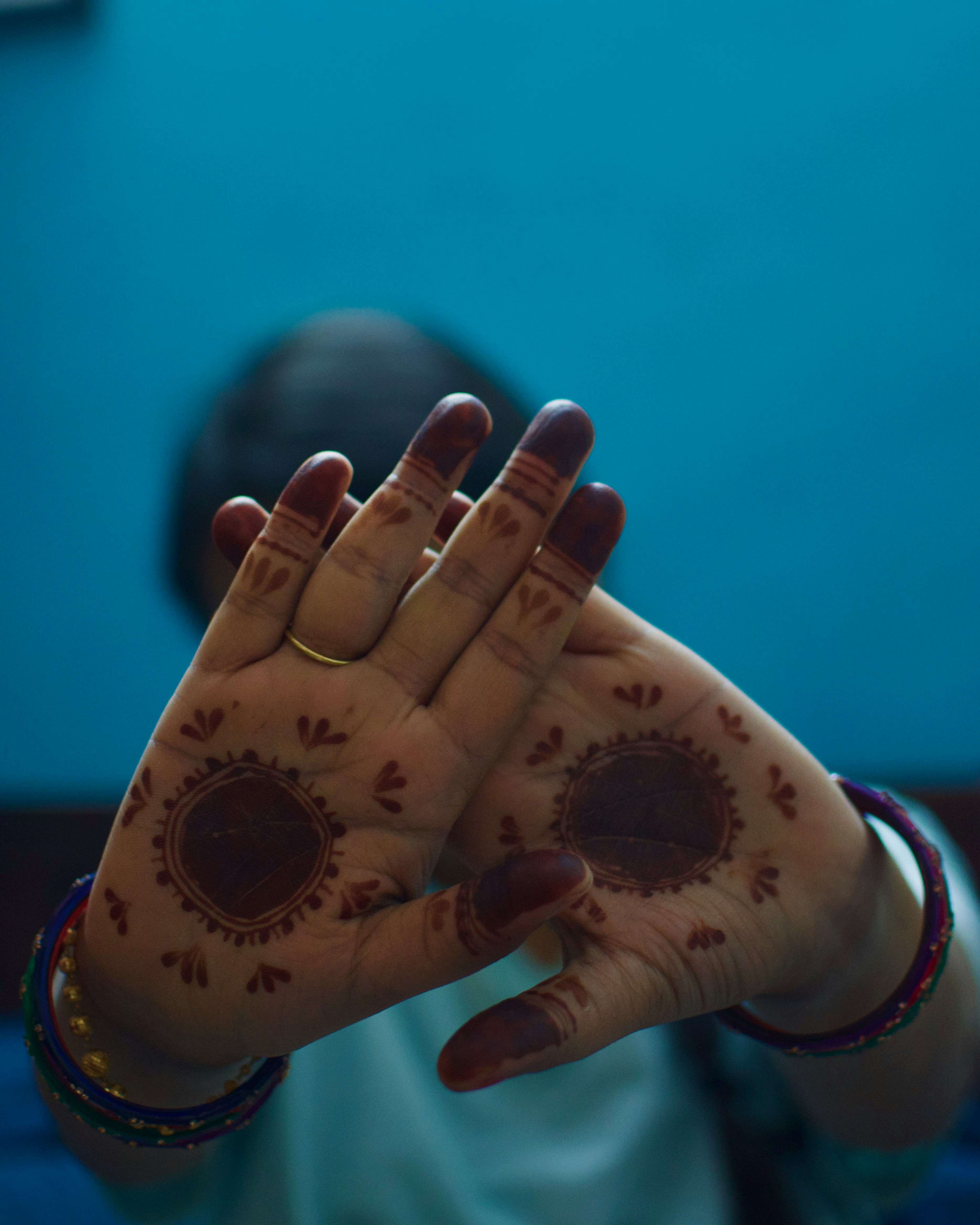 woman wearing yellow long-sleeved dress under white clouds and blue sky during daytime