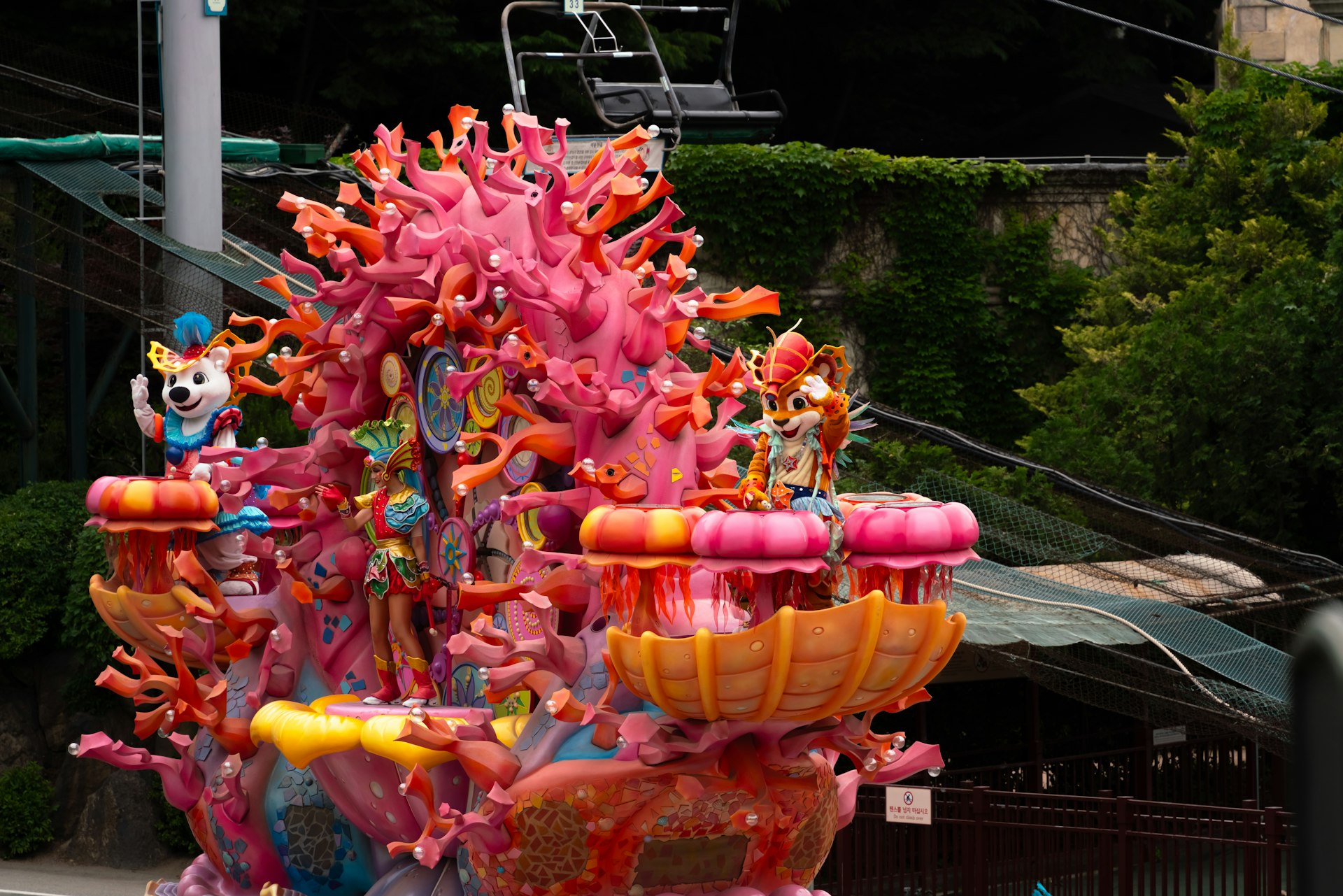 A carnival ride with lots of people riding it