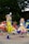 A group of people in costume dancing on a street