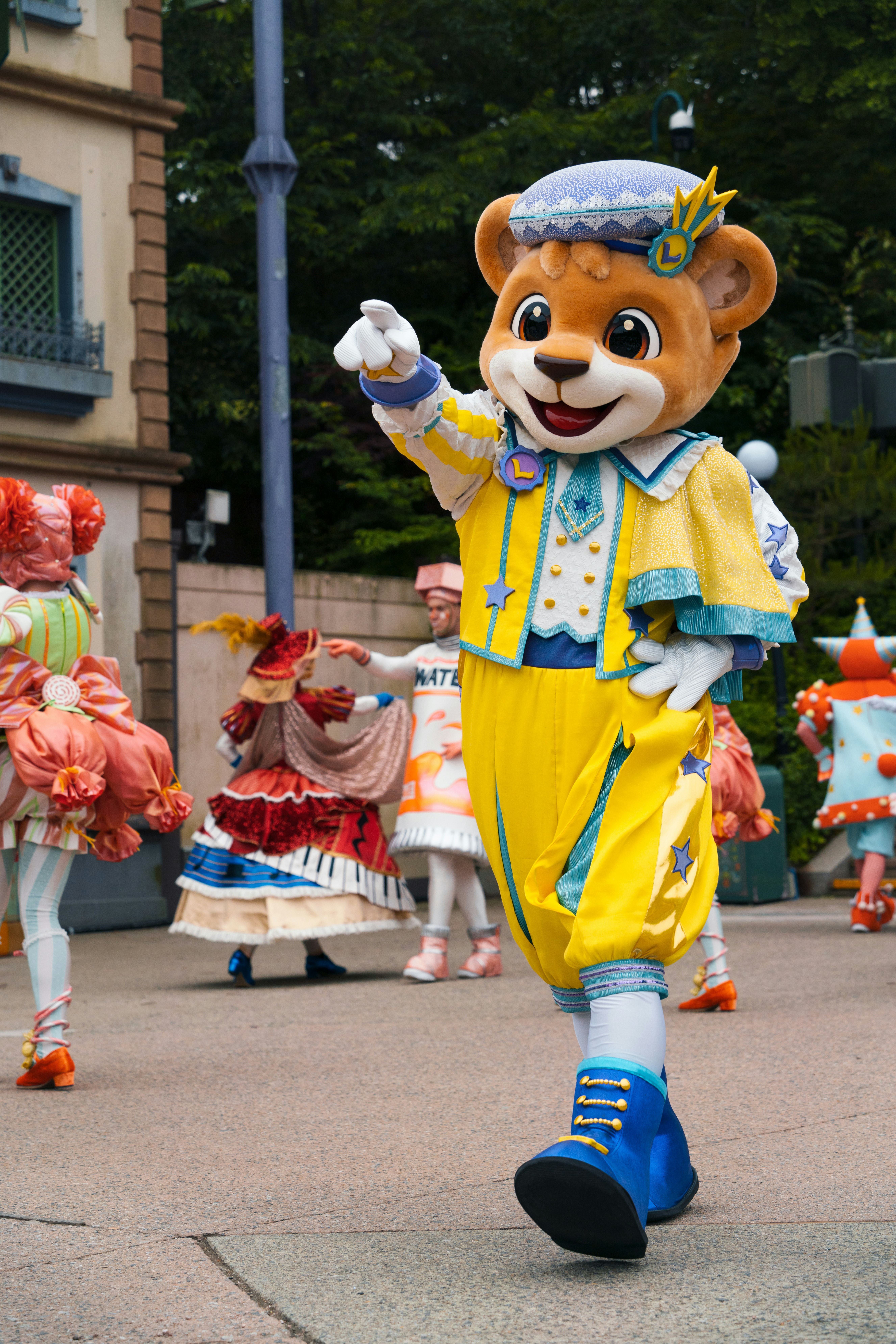A group of people in costume walking down a street