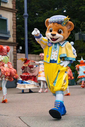 A group of people in costume walking down a street