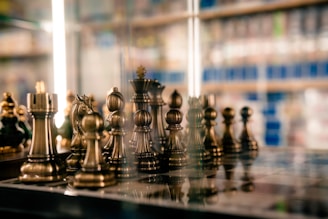 A group of chess pieces sitting on top of a table