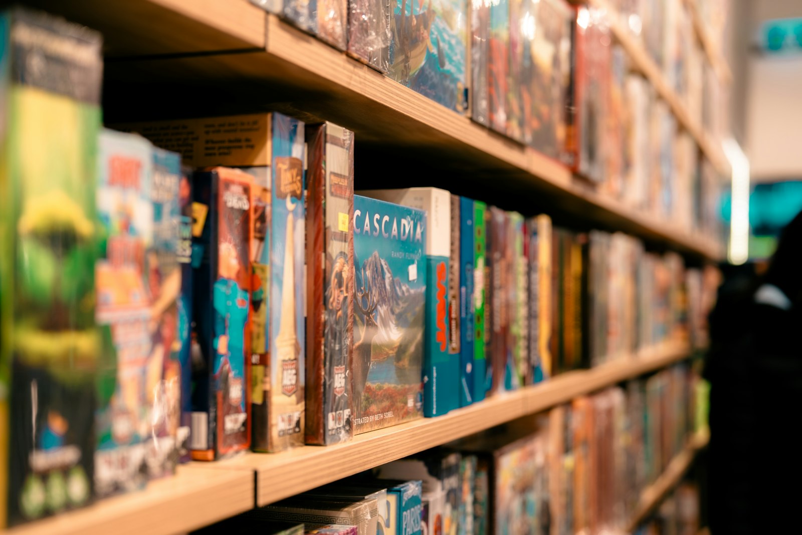 Close-up of colourful board game boxes