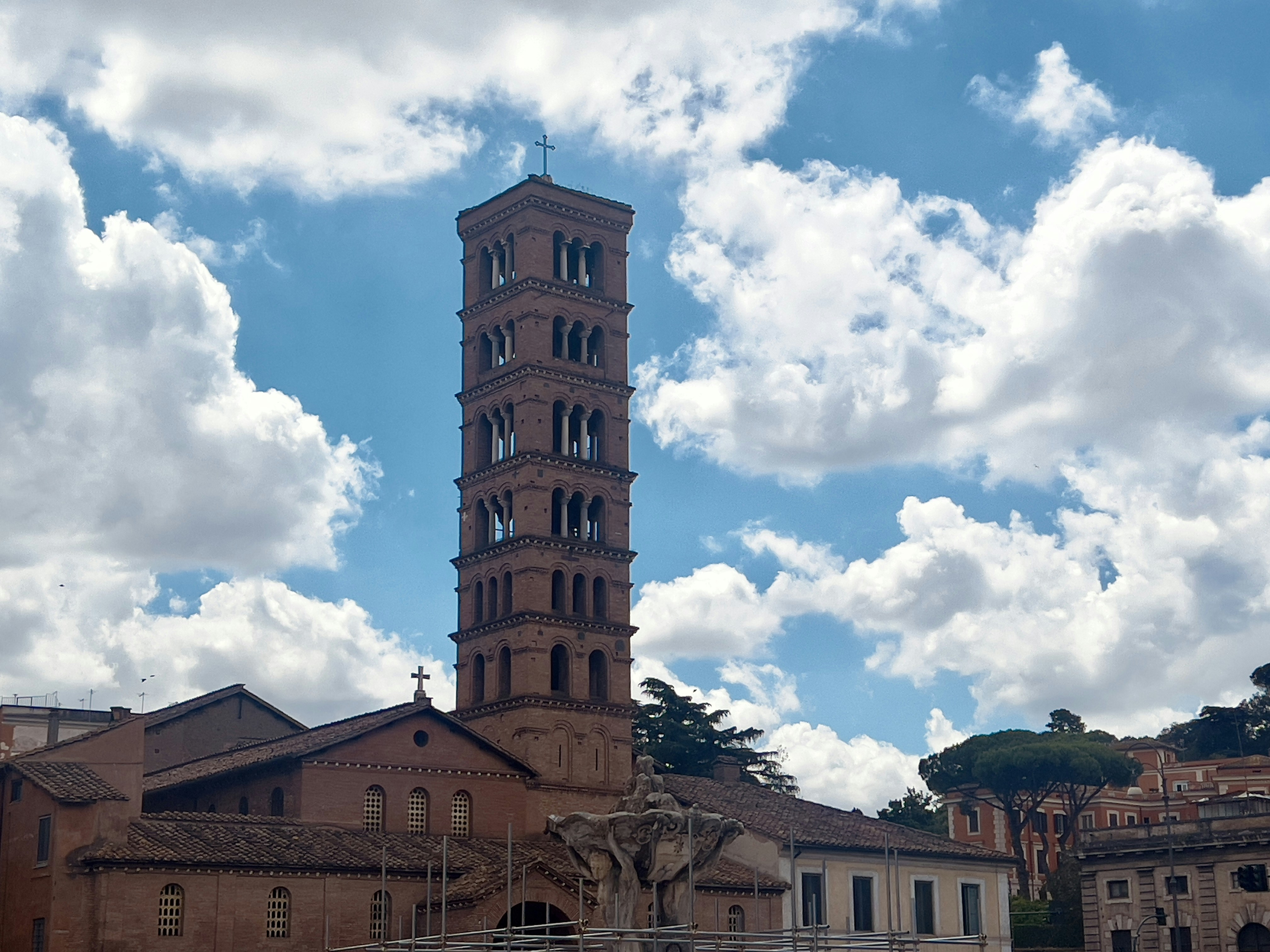 A tall clock tower towering over a city