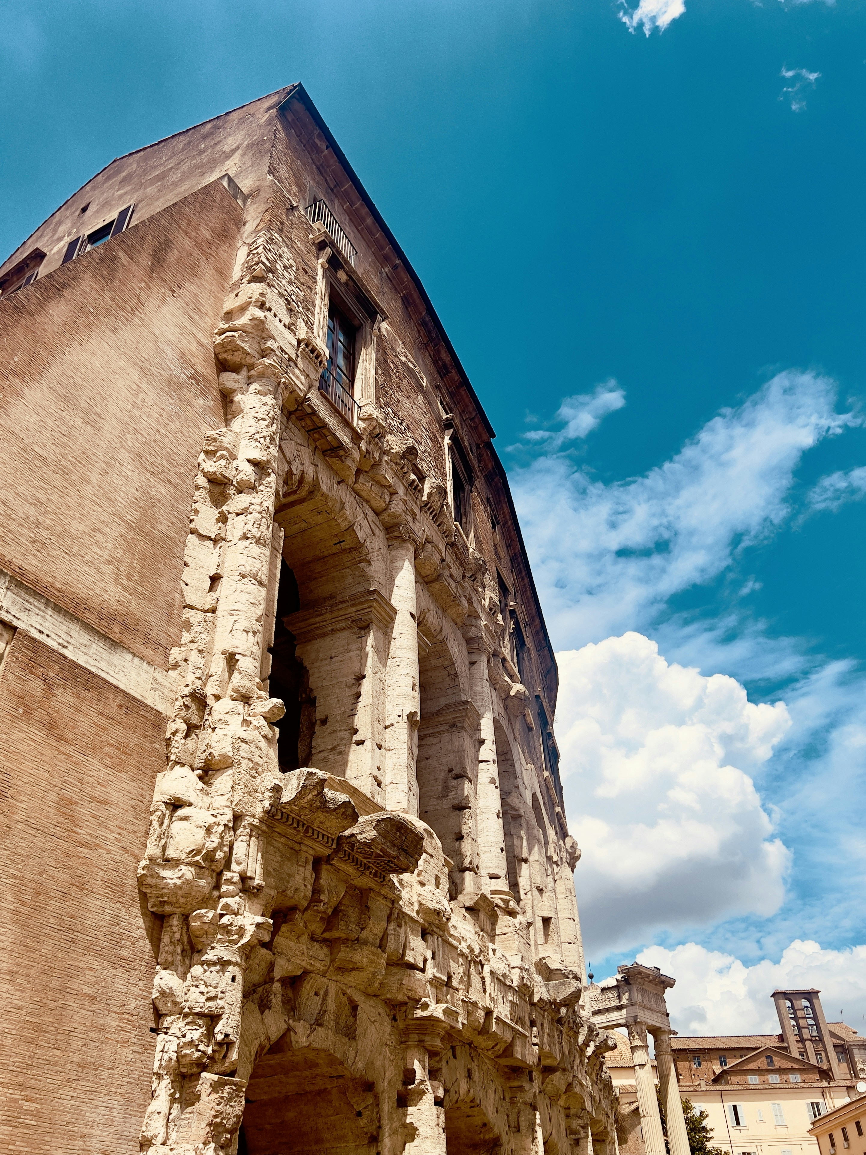 A very tall building with a sky in the background