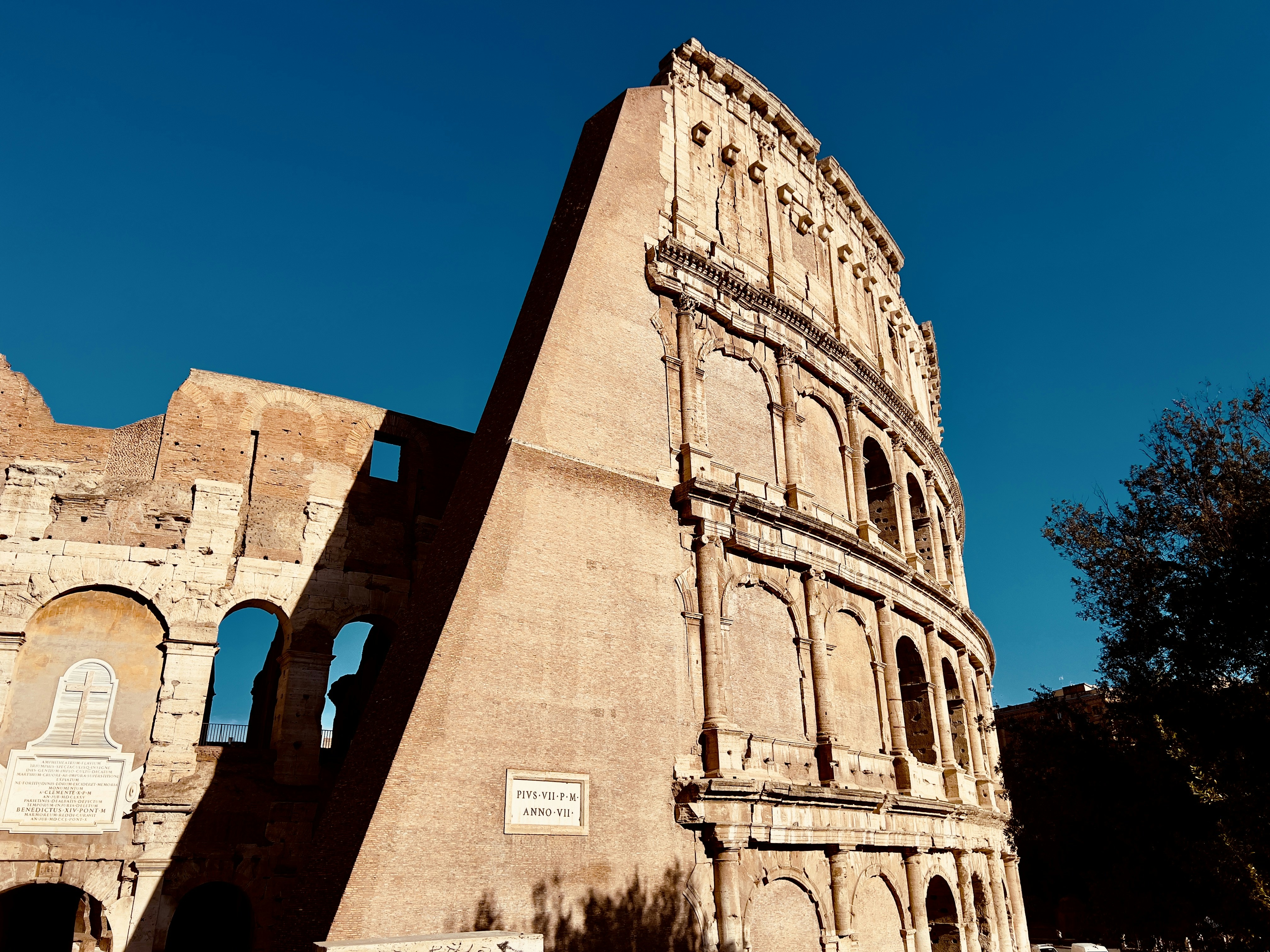 A very tall building with a clock on it's side