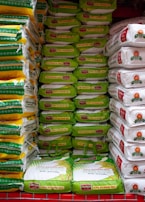 A grocery cart filled with lots of bags of food