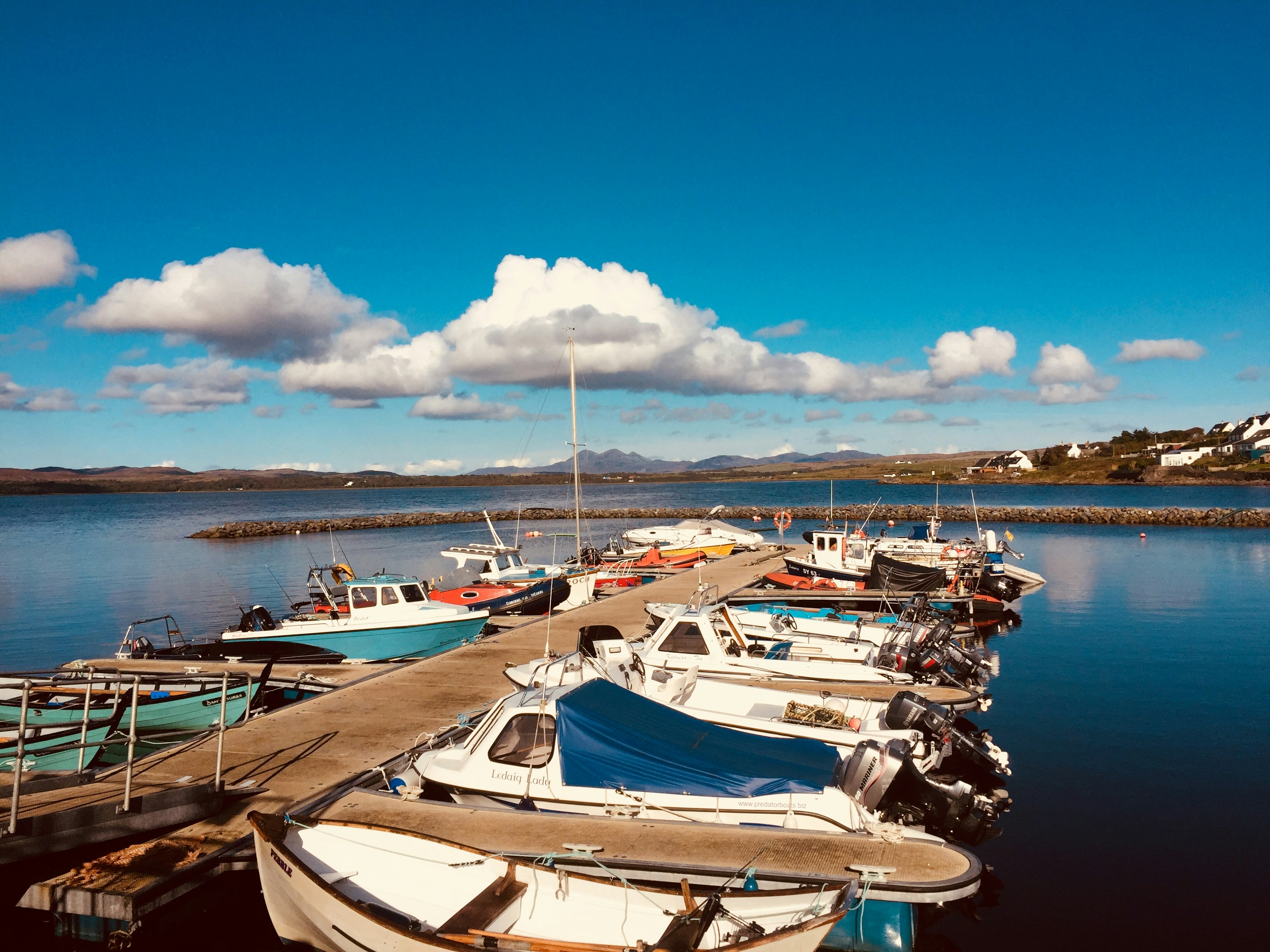 A bunch of boats that are sitting in the water