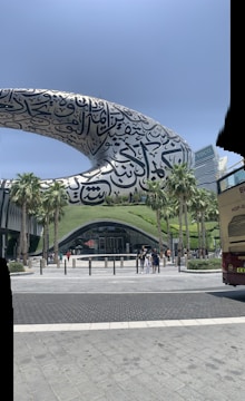 A double decker bus parked in front of a building