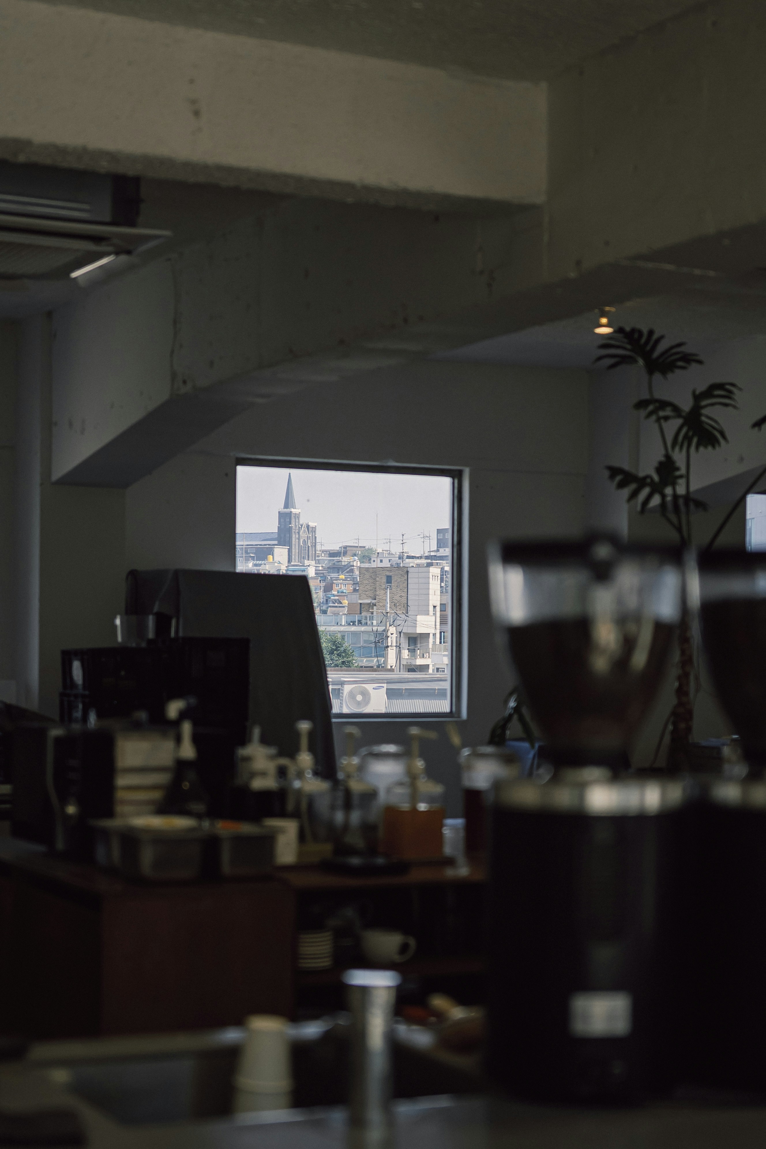 A room filled with lots of clutter next to a window photo – Free Grey ...