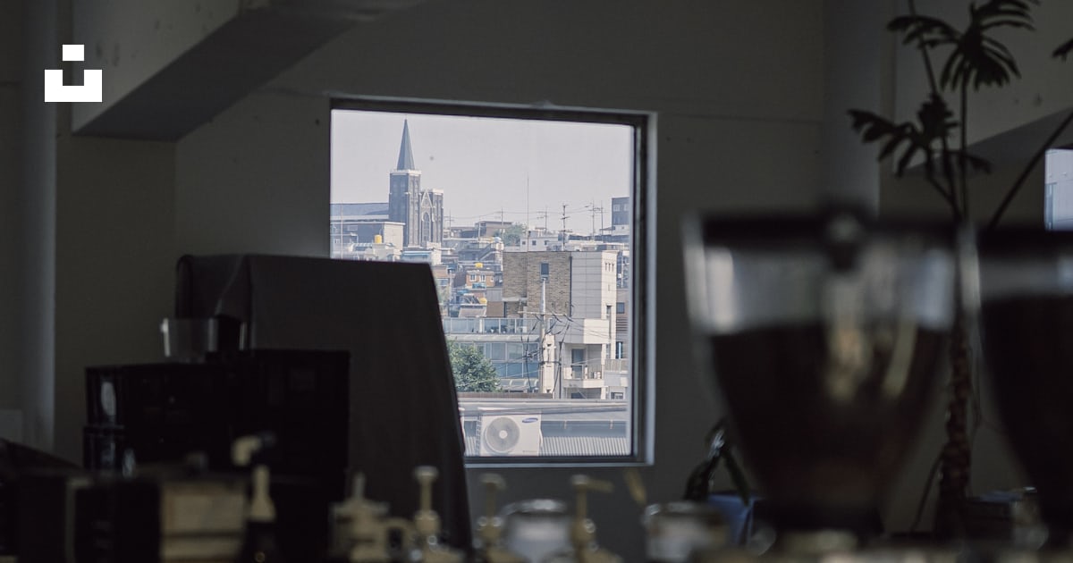 A room filled with lots of clutter next to a window photo – Free Grey ...