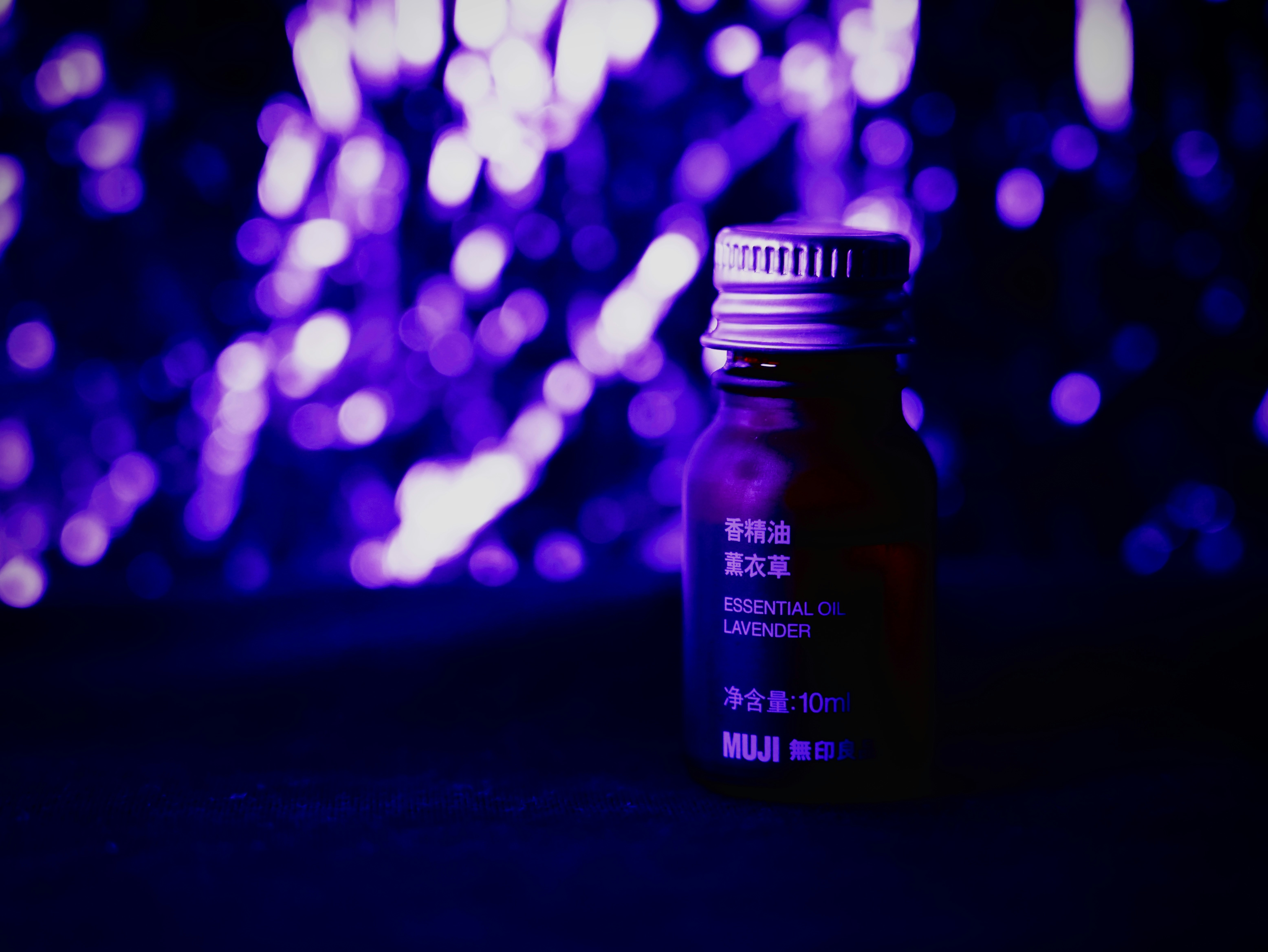 A bottle of medicine sitting on top of a table