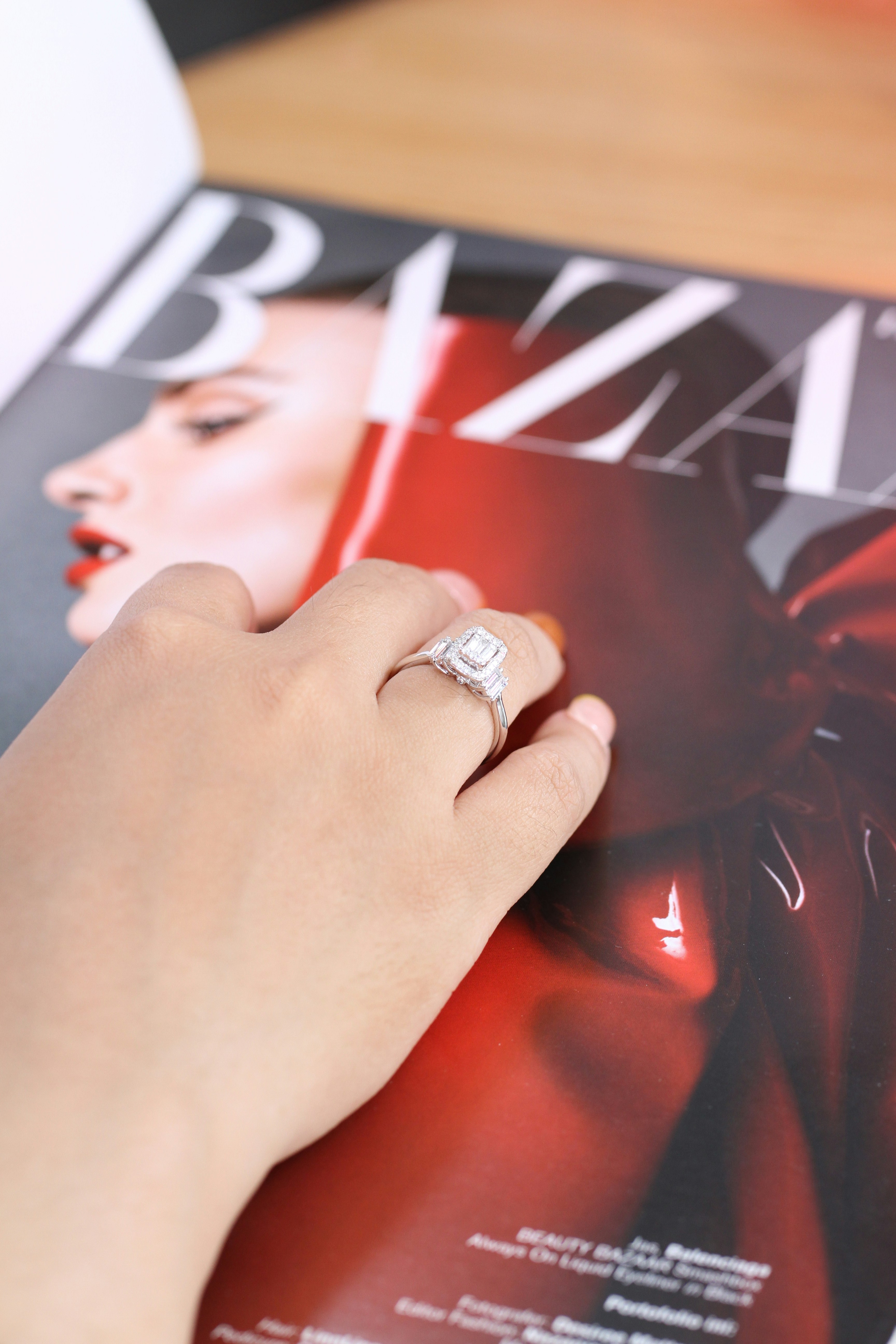 A person is putting a ring on a magazine
