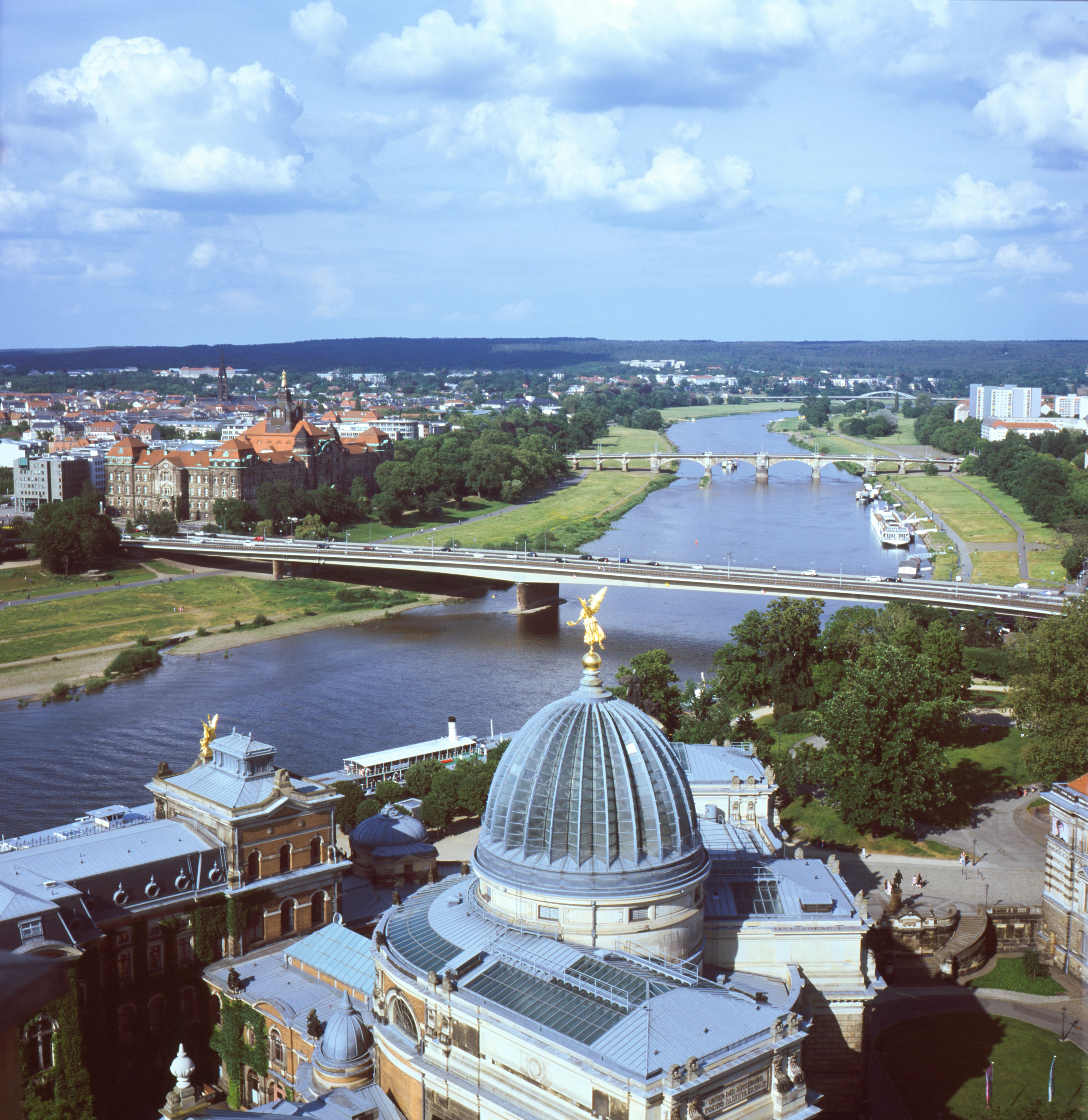 An aerial view of a river and a bridge