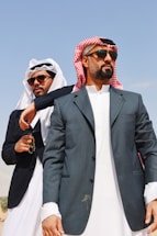 A couple of men standing next to each other