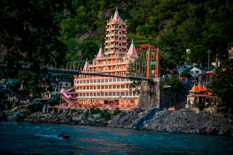 A very tall building sitting on top of a river