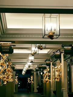 A hallway with a bunch of lights hanging from the ceiling