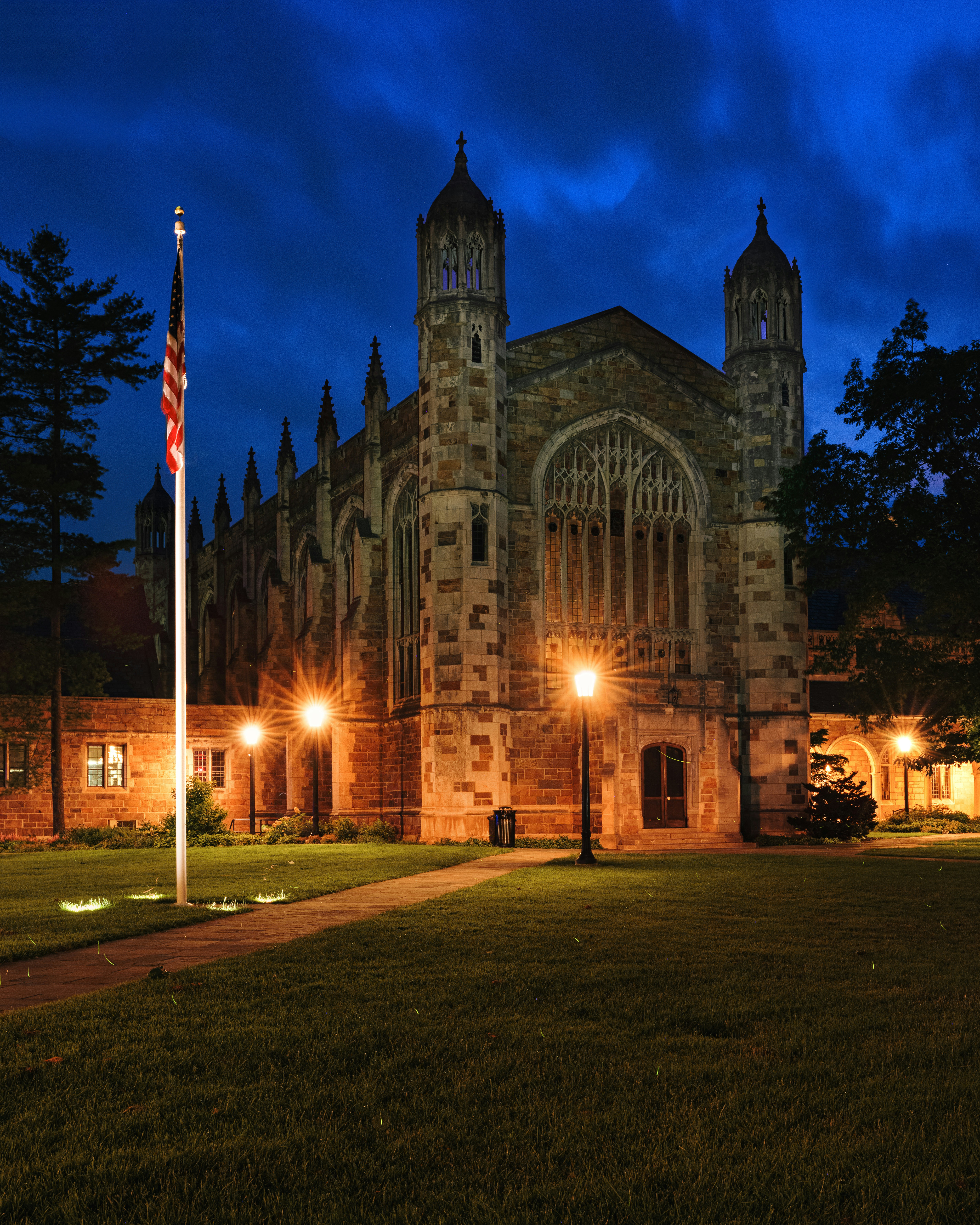 A large building with a flag on top of it