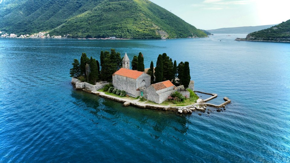 The Church of Our Lady of the Rocks on its man-made islet near Perast