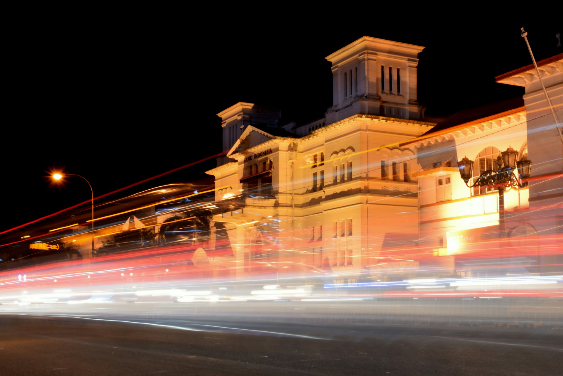 A blurry photo of a building at night