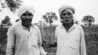 A couple of men standing next to each other