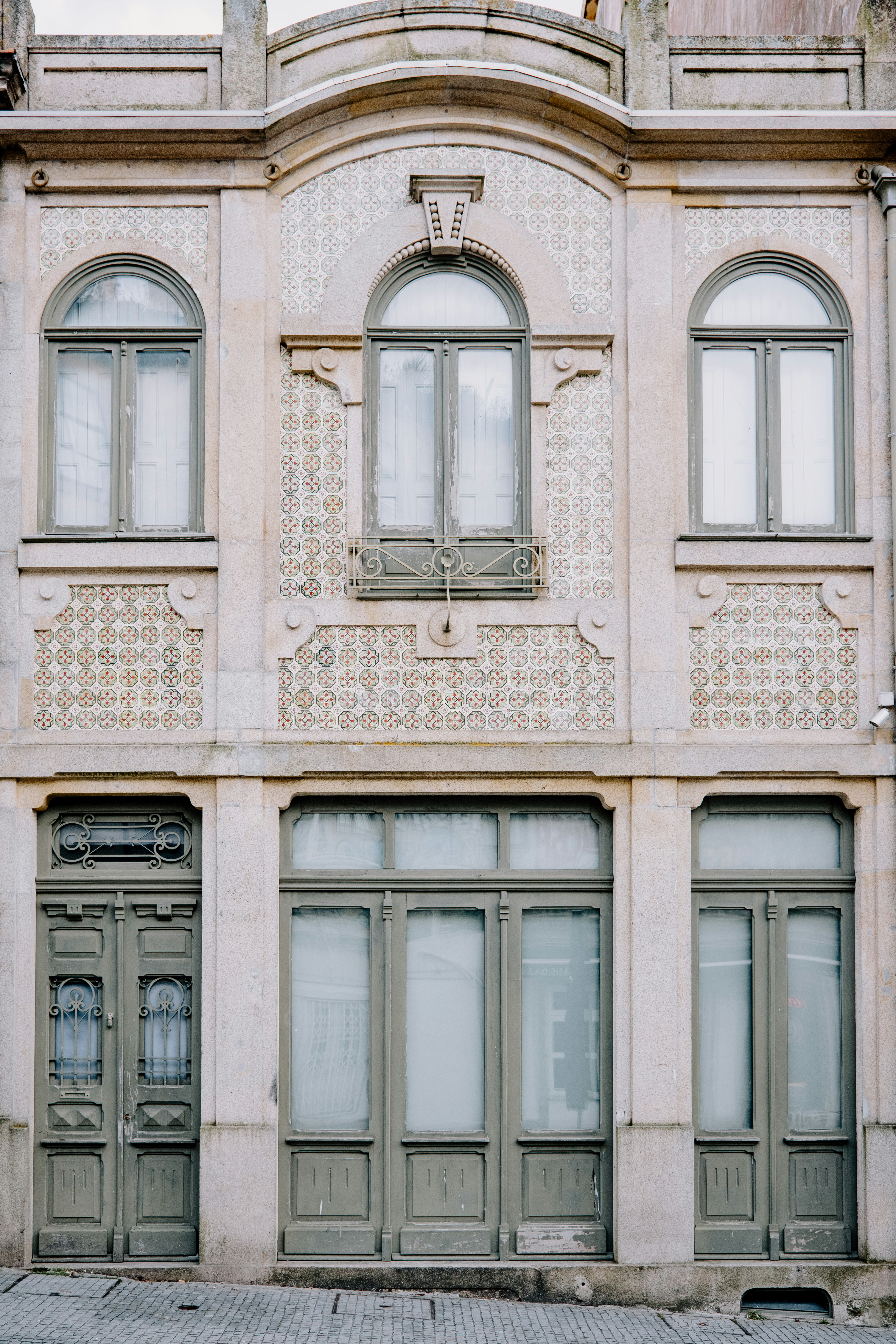 An old building with a clock on the front of it