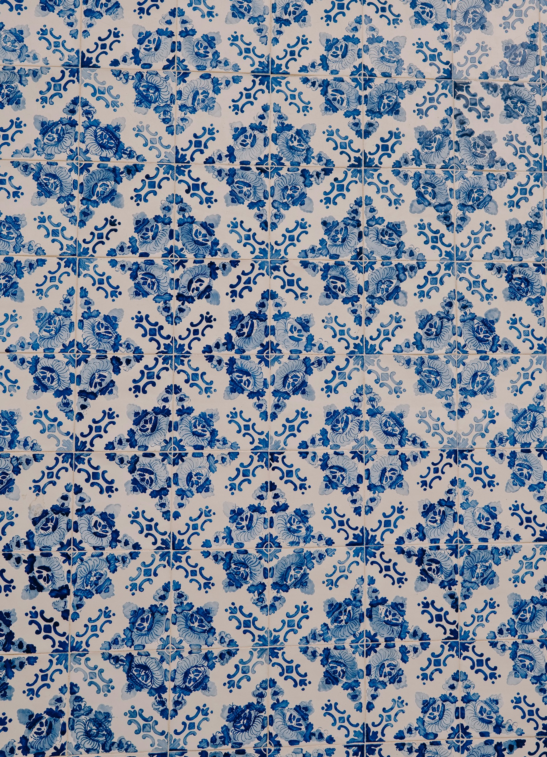 A blue and white rug with a design on it