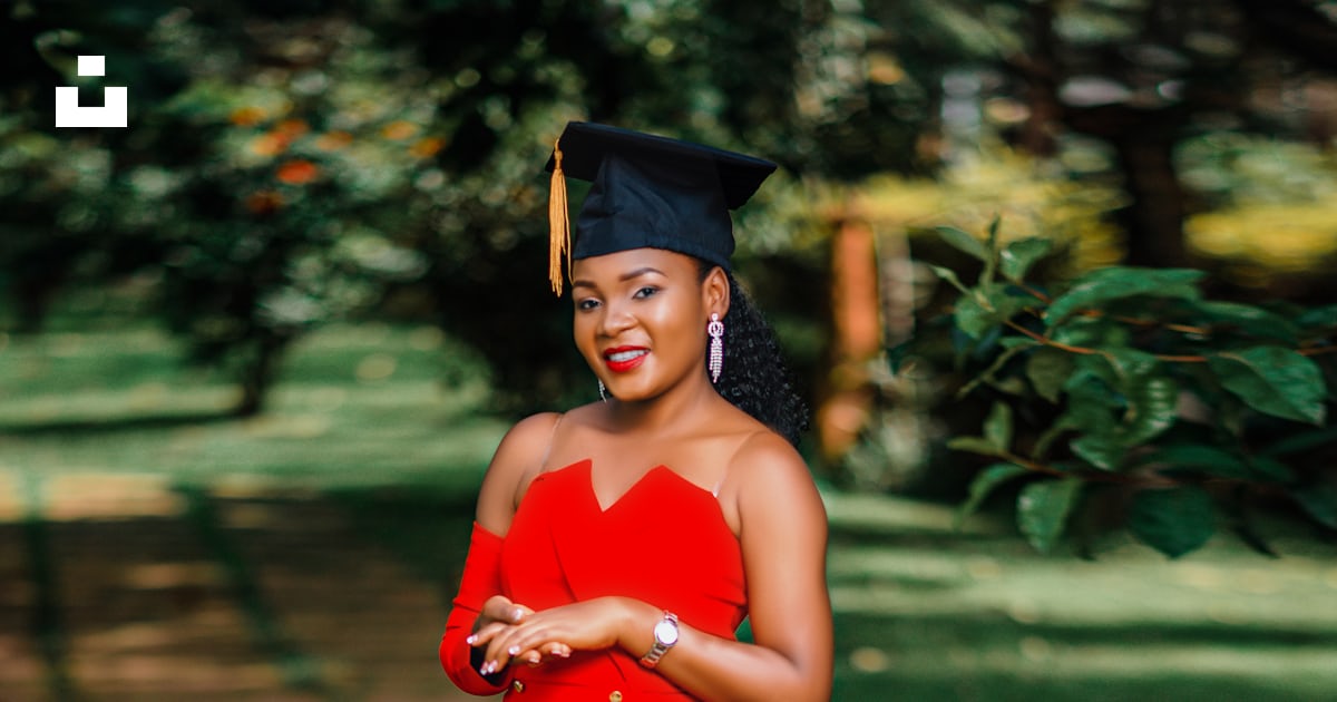A woman in a red dress and a graduation cap photo β Free Rwanda Image ...